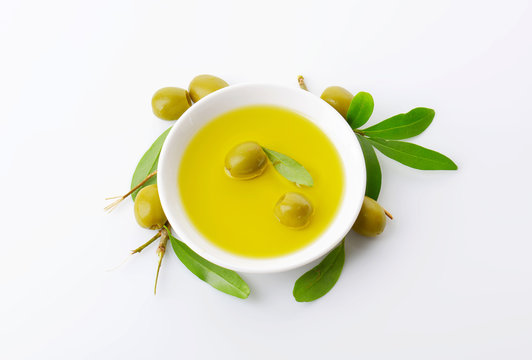 Pitted green olives and oil