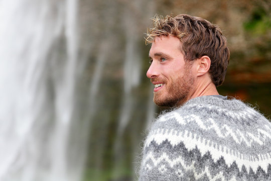 Handsome man in Icelandic sweater outdoor