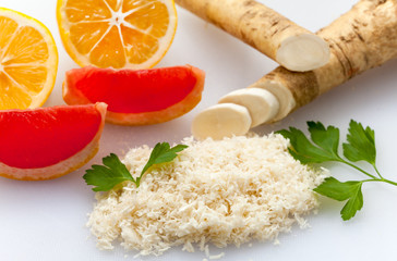 Fresh horseradish with lemon and grapefruit
