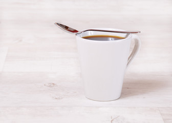 Kaffeetasse mit Löffel