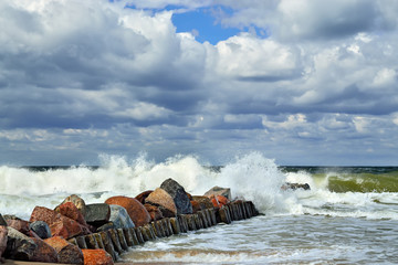 Stormy Baltic sea and breakwater