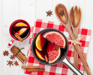 Christmas mulled wine on wooden table