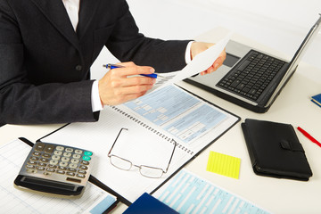 Businesswoman working with documents