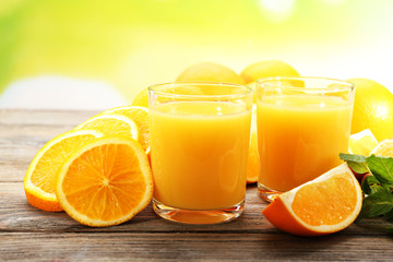 Glass of orange juice and slices