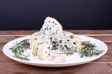 Blue cheese with sprigs of rosemary