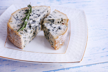 Blue cheese with sprigs of rosemary