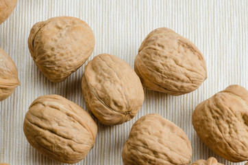 walnut on table cloth, close up