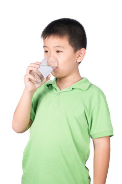 little boy with glass of water isolated on the white background