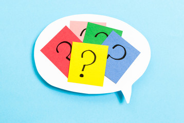 Thinking concept with question mark on blue background