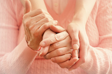 Helping hands, care for the elderly concept