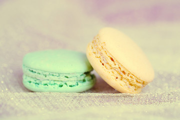 Macaroons on fabric background