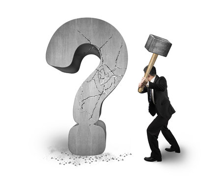 businessman holding hammer cracked question mark isolated on whi