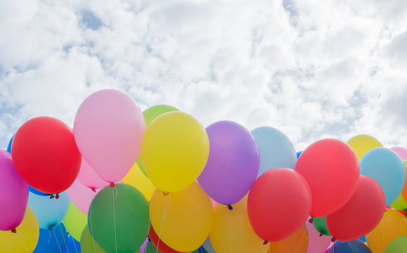 A colorful flying balloon in blue sky