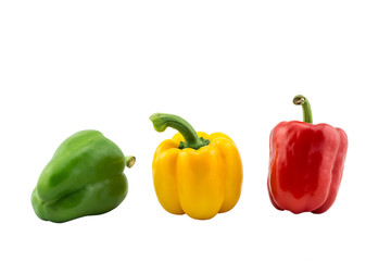 Green yellow red raw sweet pepper on white background