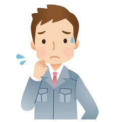 困った表情の男性　作業員