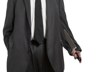 Man in suit with large knife