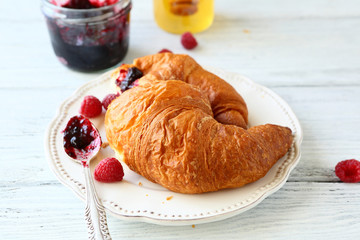 delicious croissant with berries