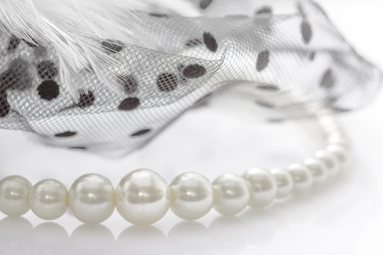 Decoration pearl and lace on white background.