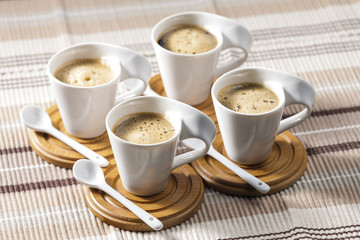 cups of coffee on place mats