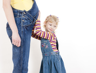 portrait of little girl with her pregnant mother