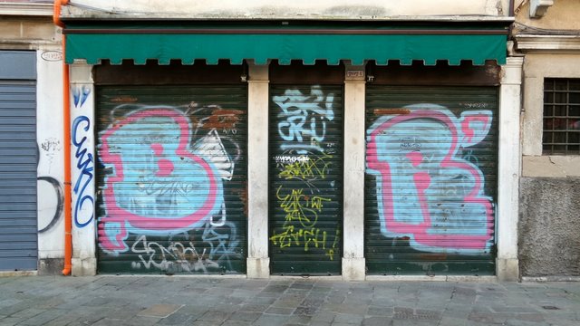 Closed shop with graffiti
