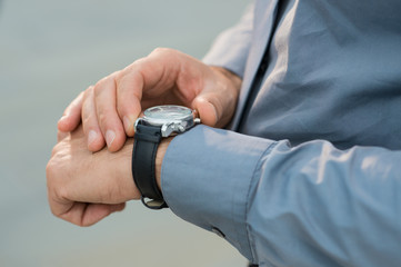 Businessman Checking Time
