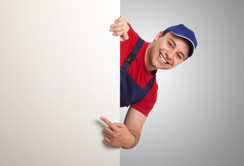 Worker pointing his finger to a blank board