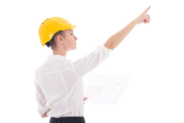 young business woman architect in yellow builder helmet with bui