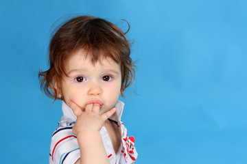 Small boy sucking fingers
