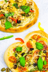 closeup pizza cheese meat vegetables