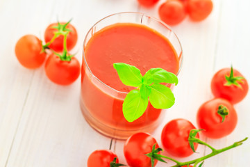 Healthy food juice red cherry tomatoes