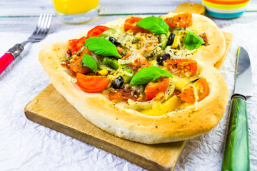 tasty pizza cheese meat olives