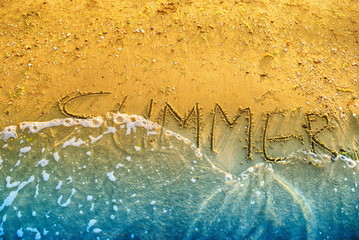 The inscription "summer" wave washes