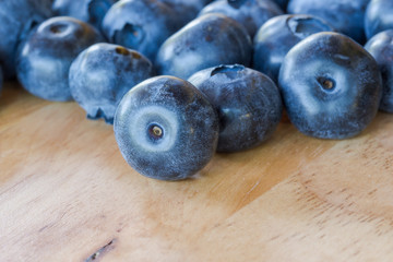 fresh blueberries on wooden table