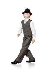 Obraz na płótnie Canvas Dancing boy in hat isolated on white
