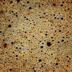 Coffee foam in a cup, photographed macro