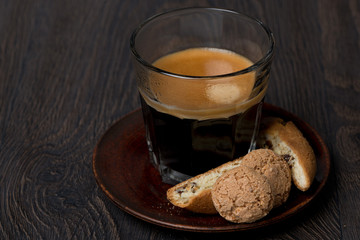 glass of espresso, biscotti and almond cookies