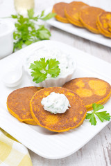 pumpkin pancakes with feta cheese sauce, vertical