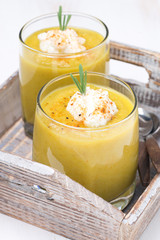 vegetable cream soup with fresh cream and rosemary