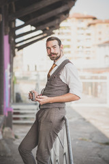 Fototapeta premium handsome big moustache hipster man smoking pipe