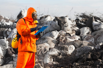Enviromental engineer working on the landfill