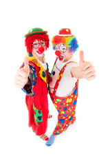 clowns zeigen begeistert die daumen hoch