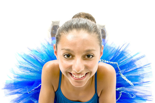 Beautiful ballet dancer with blue dress posing dance