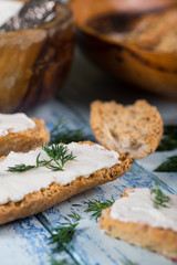 fresh dill with soft white cheese and wholegrain bread