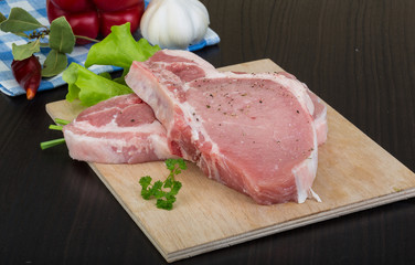 Raw t-bone steak