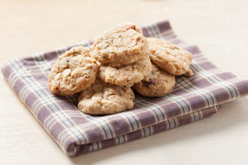 homemade oat cookies with raisin on napkin