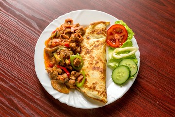 Delicious food on white plate