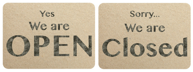 Open and closed chalk text on paper texture