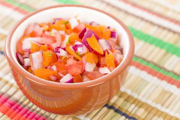 Pico de gallo - Mexican salad in a bowl.