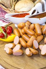 sausage on a wooden plate in a restaurant